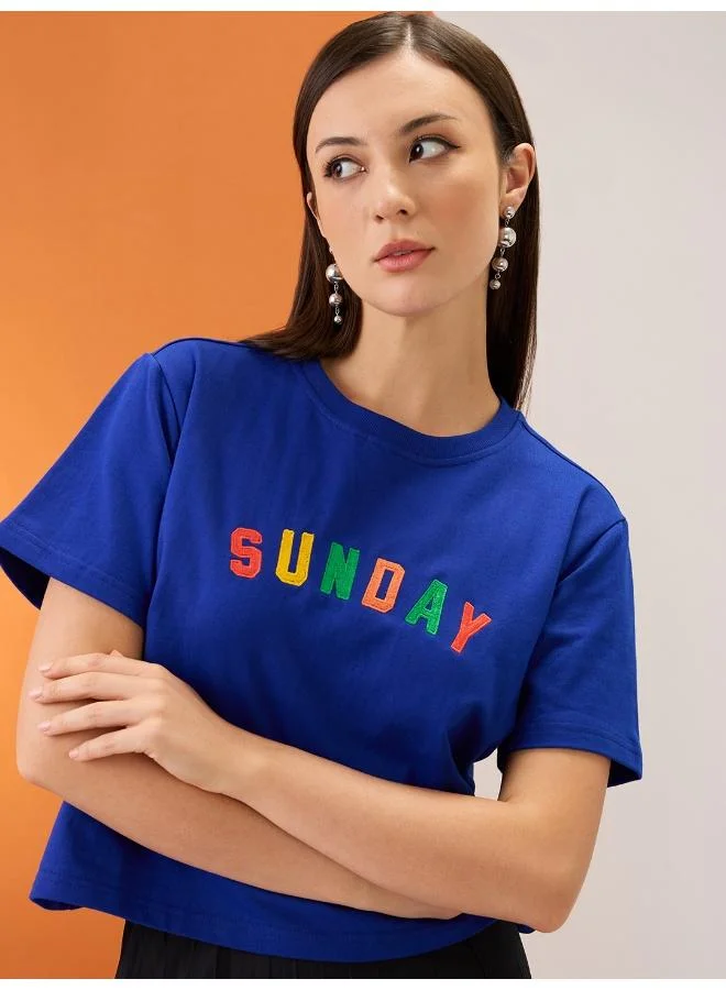 globus Globus Women Blue Embroidered Typography Round Neck Short Sleeves Boxy Fit Crop T-Shirt