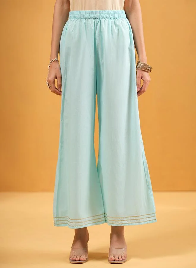 ISHIN Women's Sky Blue Cotton Embellished A-Line Tunic Upperwear Calf Length Palazzo Bottomwear Flowy 3 Peice Kurta Set