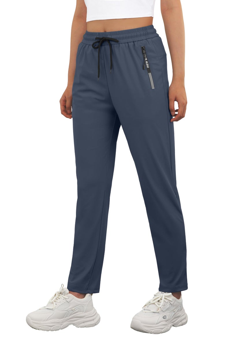 IWOLLENCE Lightweight Breathable Hiking Pants for Women Over 50 with Zipper Pockets Ladies Stretch Active Quick Dry Travel Pant Camping Workout Fishing Trousers Seniors Comfy Fit Navy Blue, L - Image 1