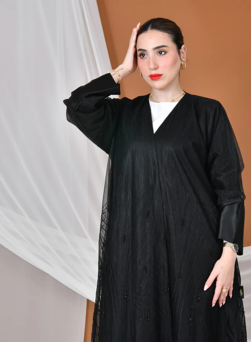 HAWRAA ABAYA Black wrap abaya with embroidered organza fabric and decorated with delicate embroidery with taffeta overlay