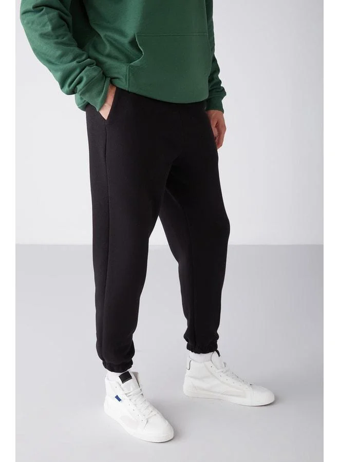 GRIMELANGE Inside Men's Regular Fit Soft Fabric Waist Elastic Black Sweatpants.