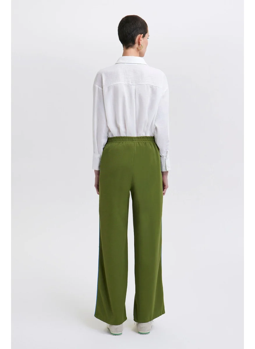 توتشي Wide Leg Linen Trousers with Piping Detail