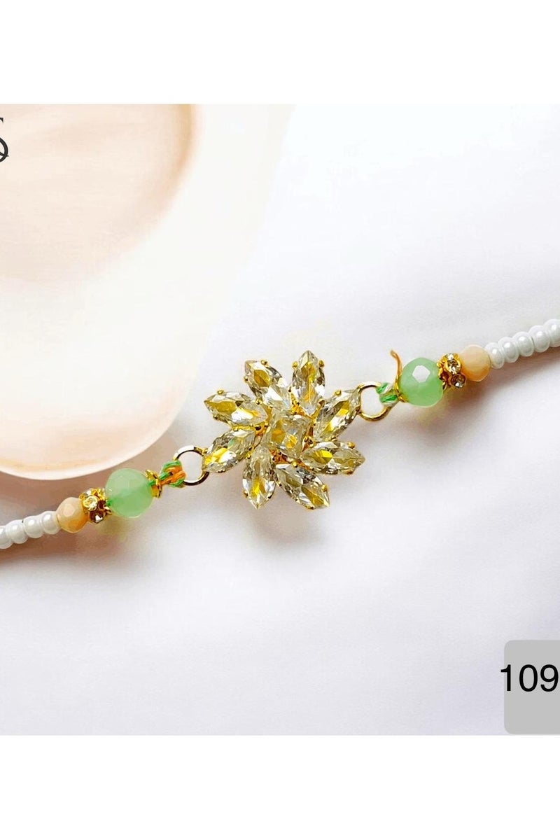 كريستال جميل بهاي راخي/ زهرة كريتال في القطعة المركزية/راكشاباندان