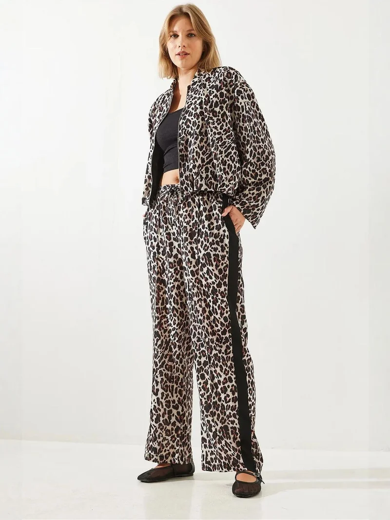 بيانكو لوتشي بنطلون واسع الأرجل بطبعة جلد الفهد بخصر عالٍ من لوتشي