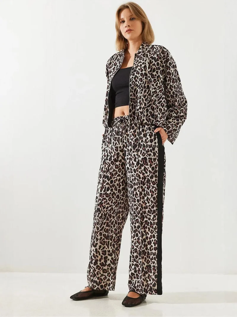 بيانكو لوتشي بنطلون واسع الأرجل بطبعة جلد الفهد بخصر عالٍ من لوتشي