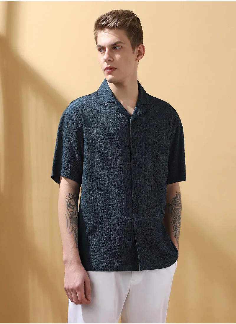 Dennis Lingo Upgrade your wardrobe with this premium Blue Relaxed fit Shirts Textured design crafted from 100% Polyester featuring Half Sleeve with Button closure.