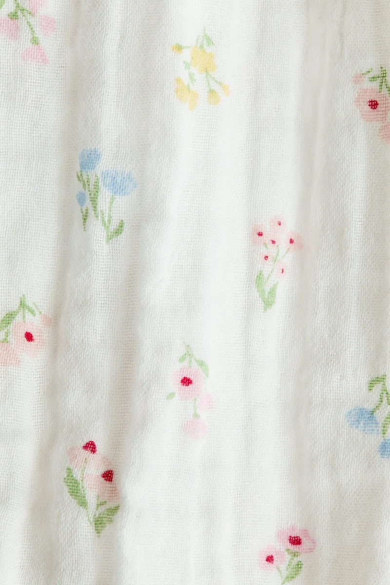 H&M Frilled muslin romper suit