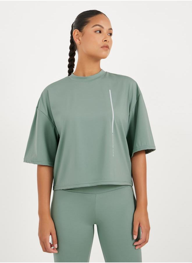 Styli Gymspire Edition - Label Striped and Text Print Boxy Short Sleeve Top  - Image 1