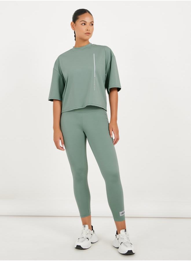 Styli Gymspire Edition - Label Striped and Text Print Boxy Short Sleeve Top  - Image 2