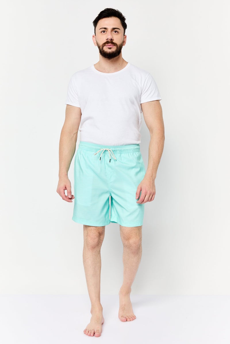 DOCKERS شورتات سباحة بسيطة للرجال بطول 7 إنش، أخضر نعناعي - Image 4