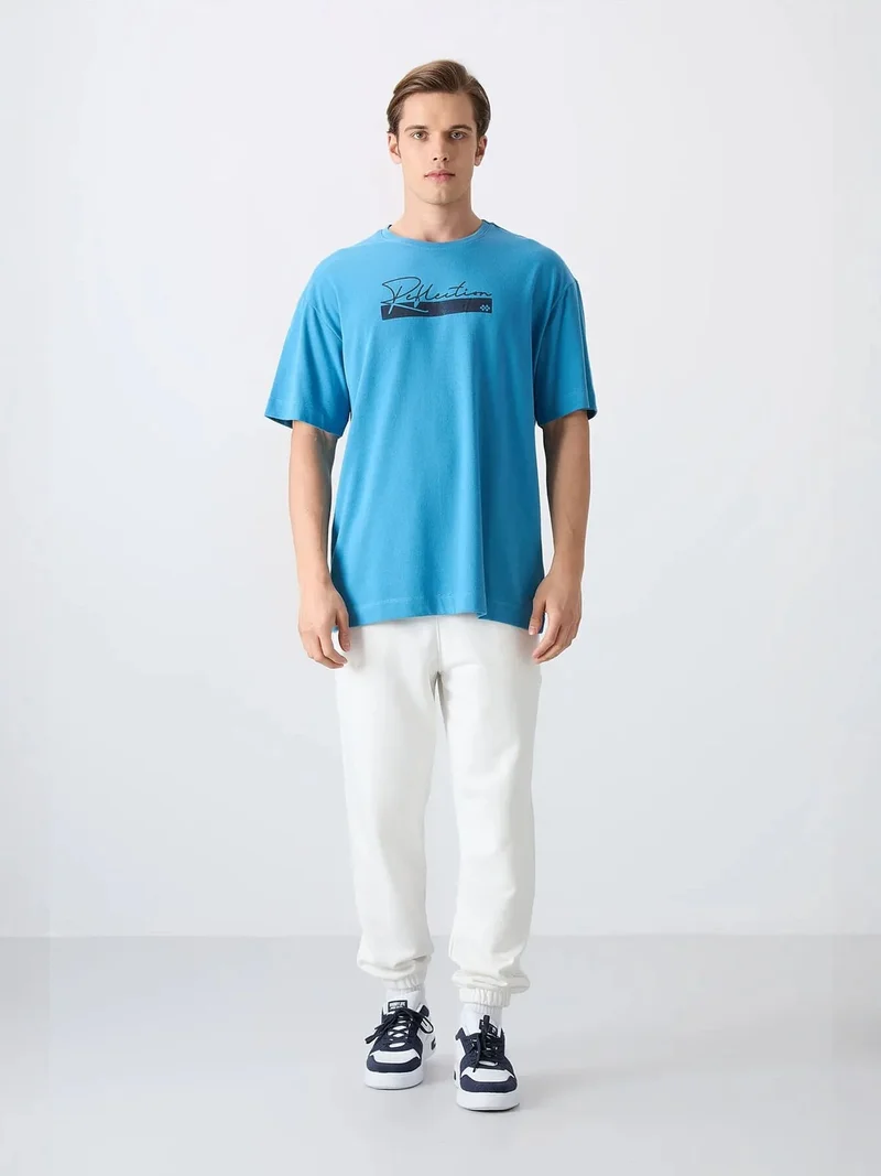 تومي لايف TOMMY Oversized Logo Crew Neck T-Shirt