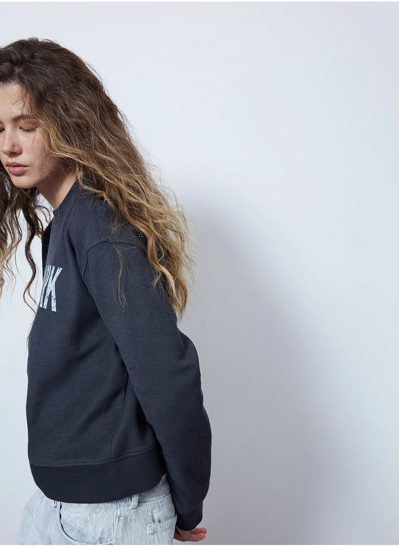 H&M Oversized Motif-Front Sweatshirt