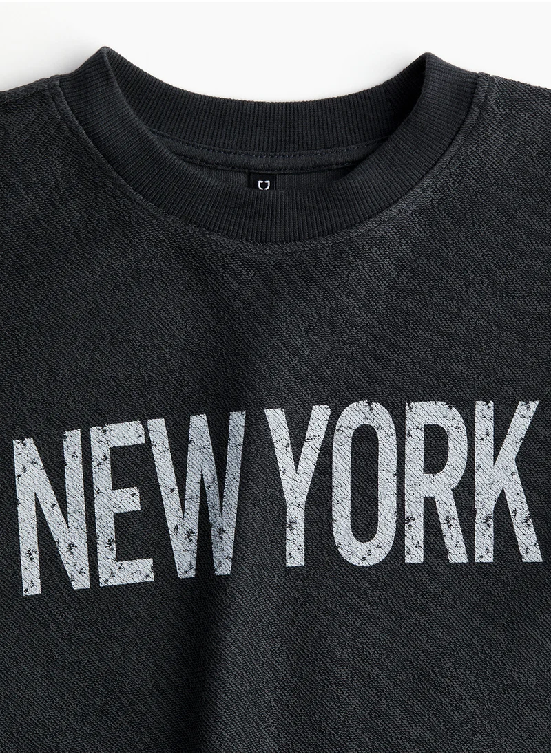H&M Oversized Motif-Front Sweatshirt