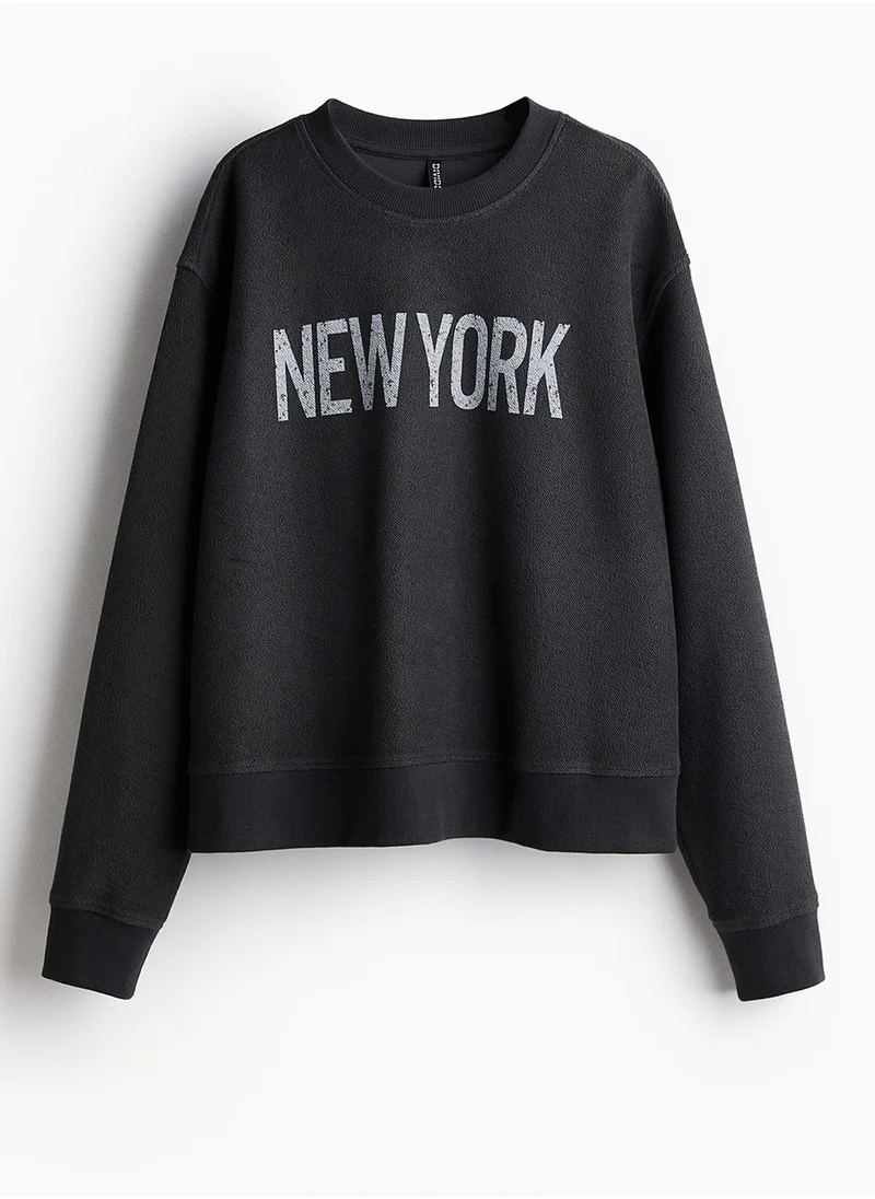 H&M Oversized Motif-Front Sweatshirt