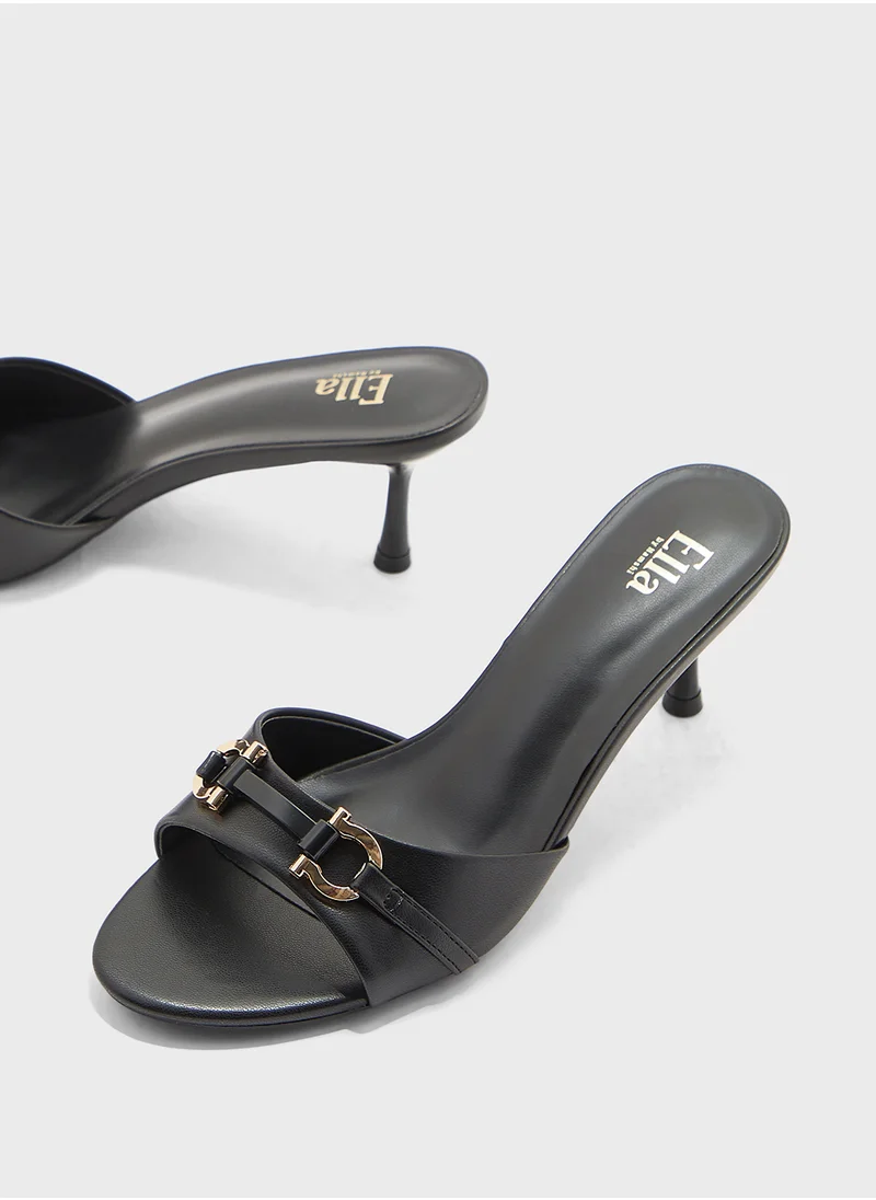 ايلا Horse Bit Trim Mule Heel Sandal