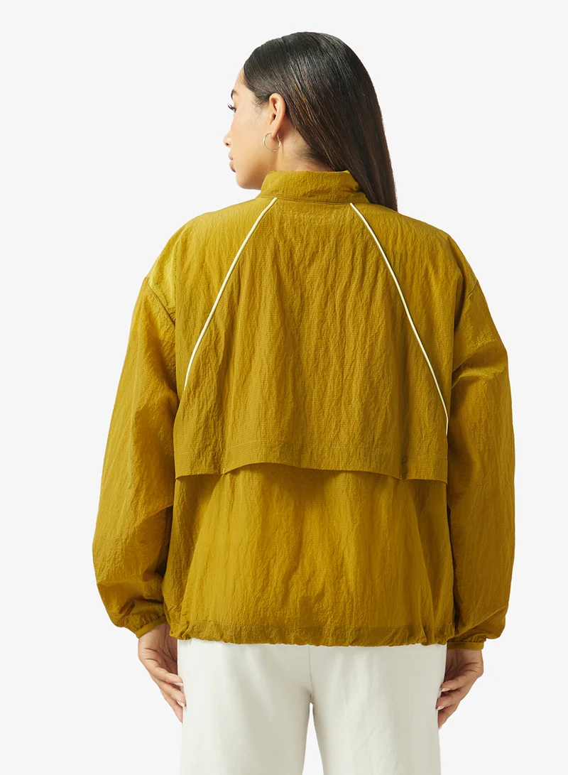 New Balance BASIL OIL (BIL) Legacy Jacket for Women | Best Price UAE