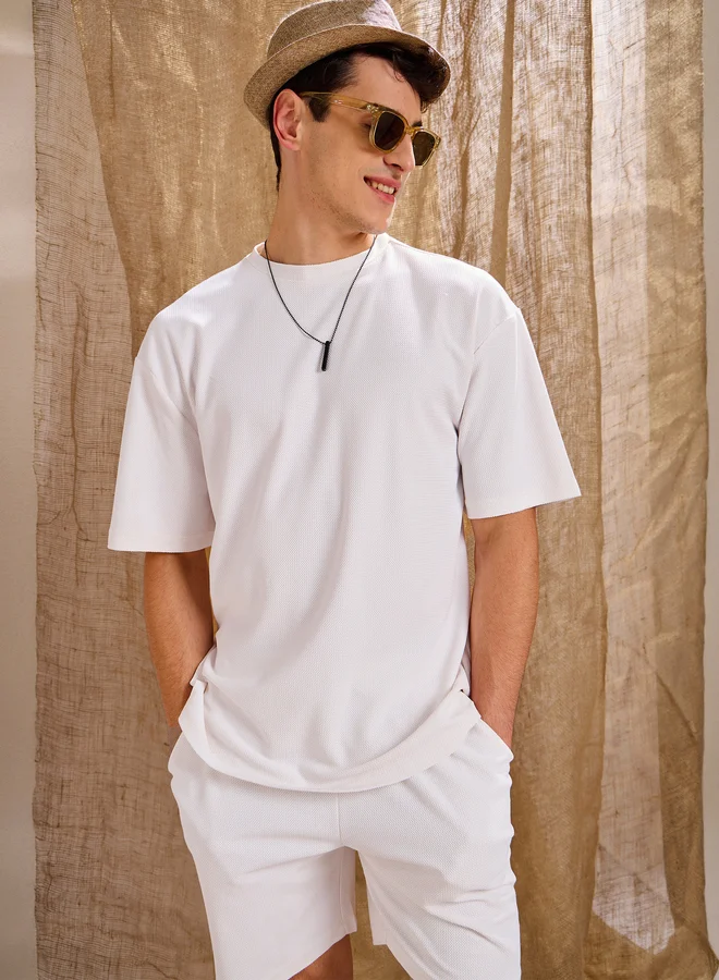 SASSAFRAS Sassafras Men White Waffle Textured Oversized T-Shirt and Shorts Co-Ords