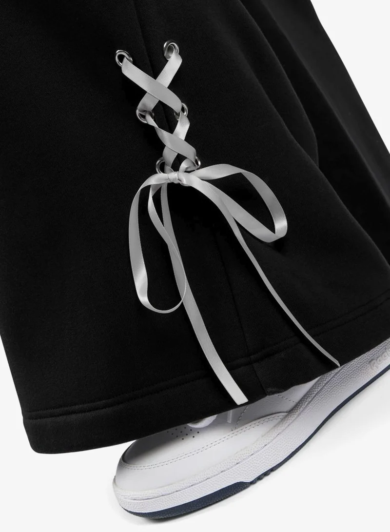Reebok  Glitz Ribbon Joggers for Women | Best Price UAE