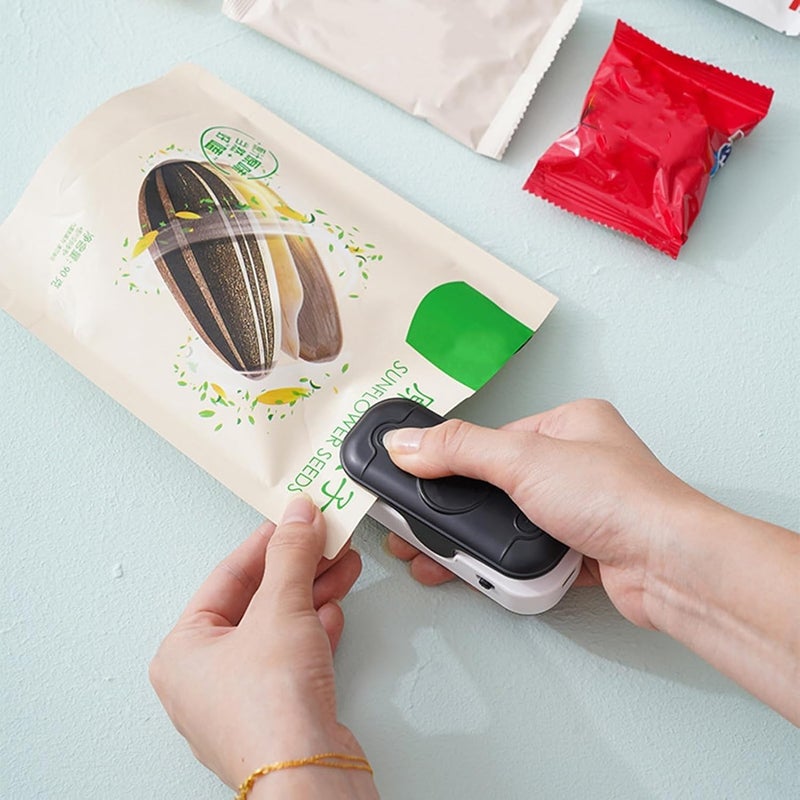 RAMPKD Mini Bag Sealer Machine 2 in 1 Heat Sealer with Cutter Bag Sealer with Cutter Portable Resealer Food Sealing Machine Mini Sealing Machine for Plastic Bags Food Storage Snacks Black - Image 1