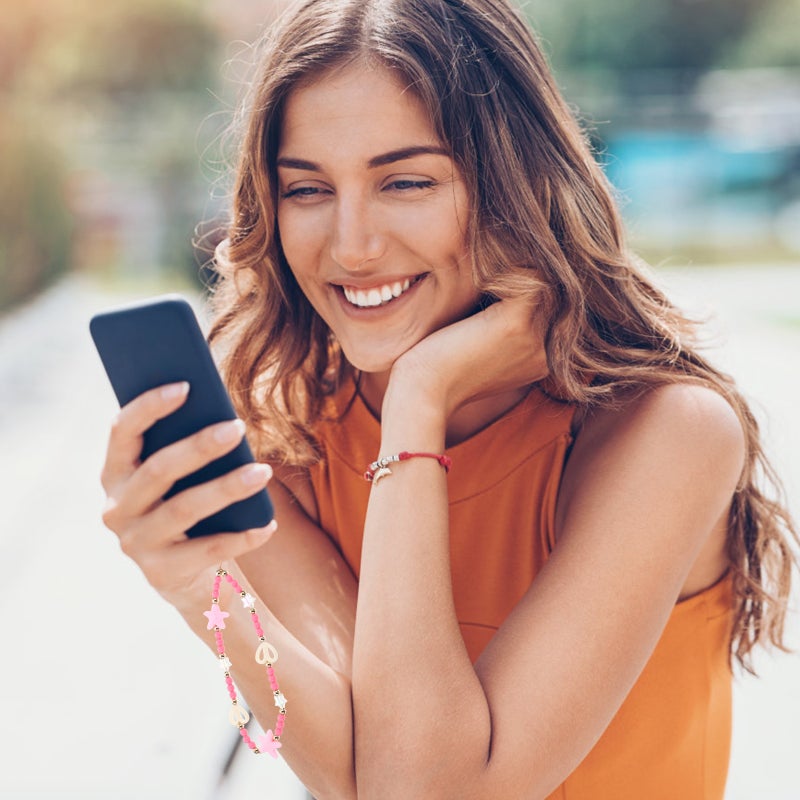 📱 معصم لهاتف محمول مزين بحبات على شكل قلب مجوف مقاوم للفقدان - Image 1