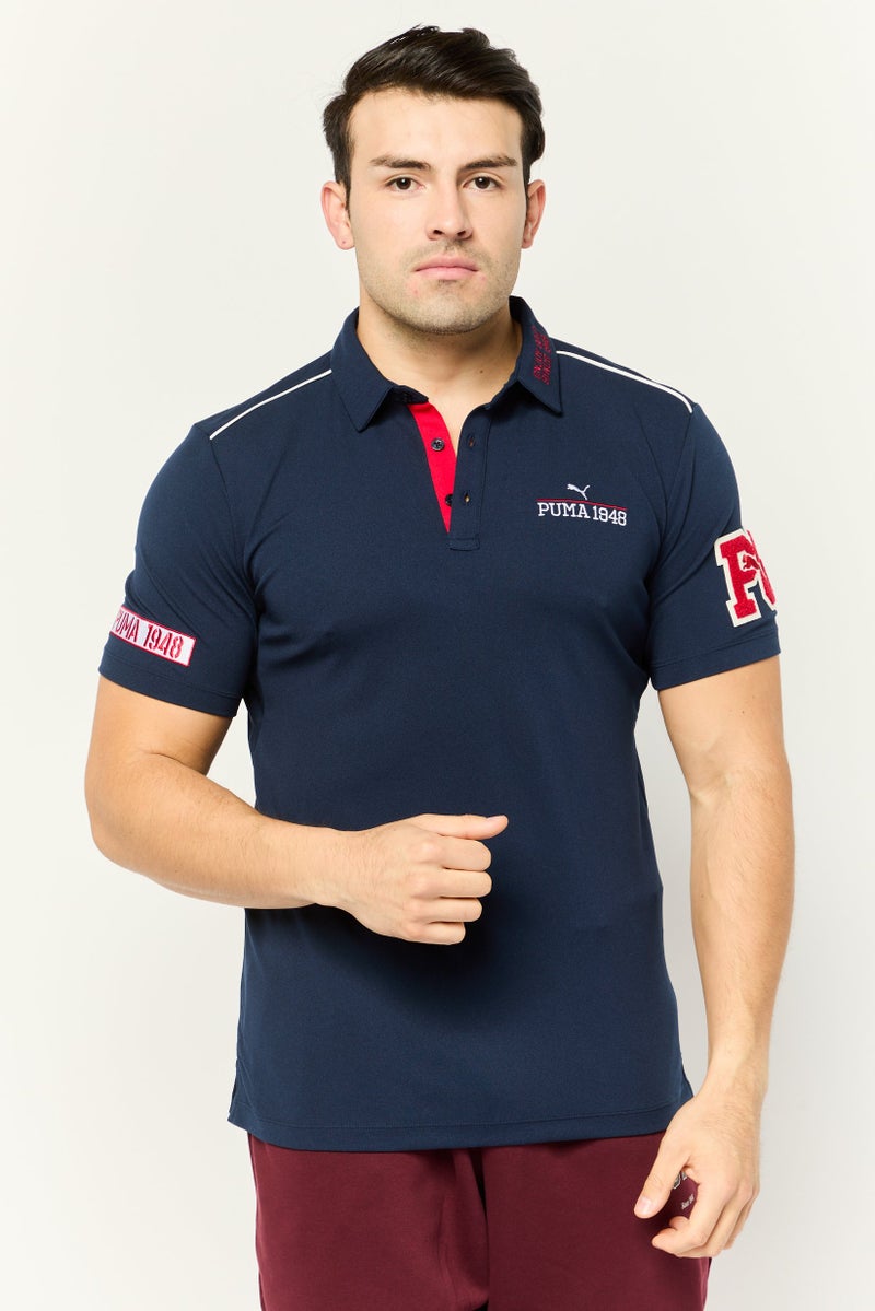 PUMA تي شيرت بولو جولف للرجال بأكمام قصيرة مزخرفة، لون كحلي - Image 1