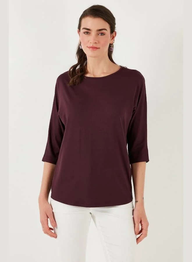 ليلا بلوزة نسائية ليلا بثلاثة أرباع كم وياقة دائرية