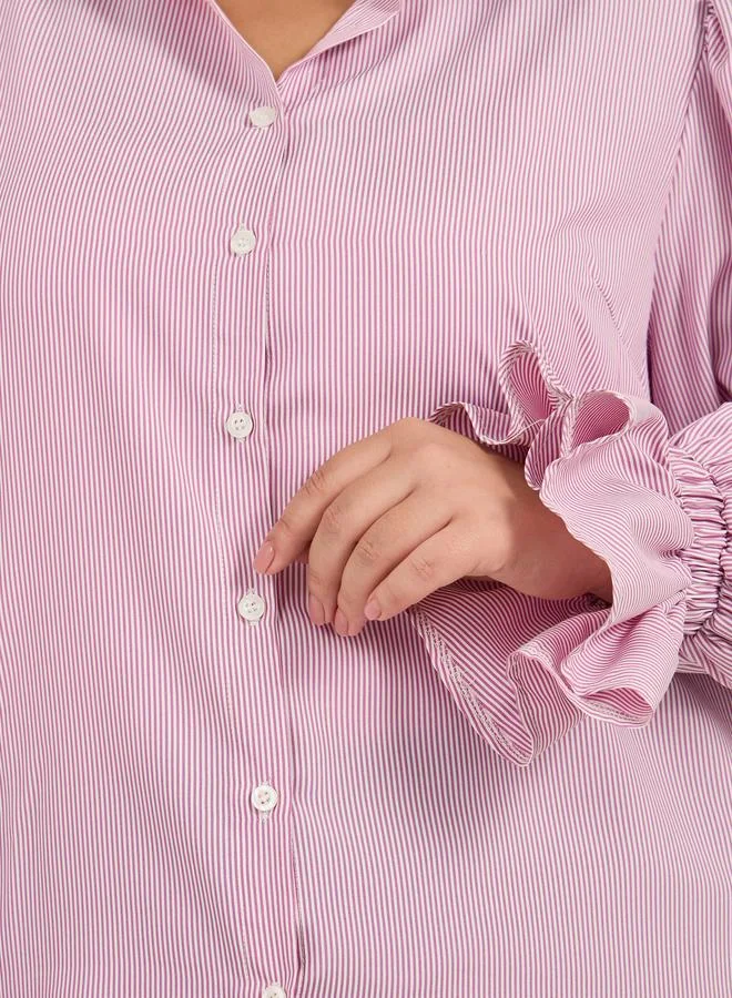 ستايلي بلوزة مخططة بمقاس كبير وأكمام بالون