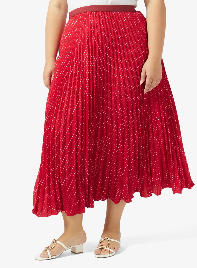 ايلا بلس تنورة مقاس كبير بطبعة منقطة