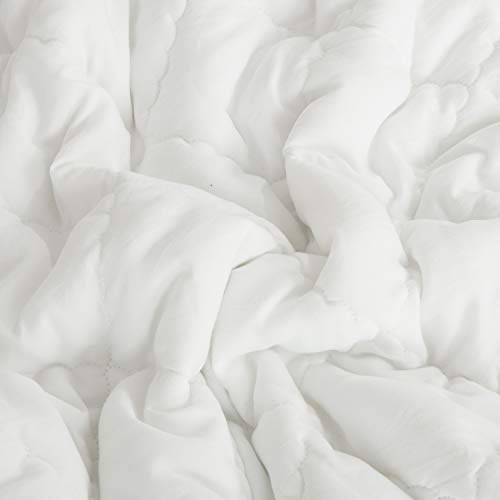 NTBAY Down Alternative Toddler Comforter, Lightweight and Warm Solid Color Baby Crib Quilted Blanket, 39x47 inches, White - Image 2