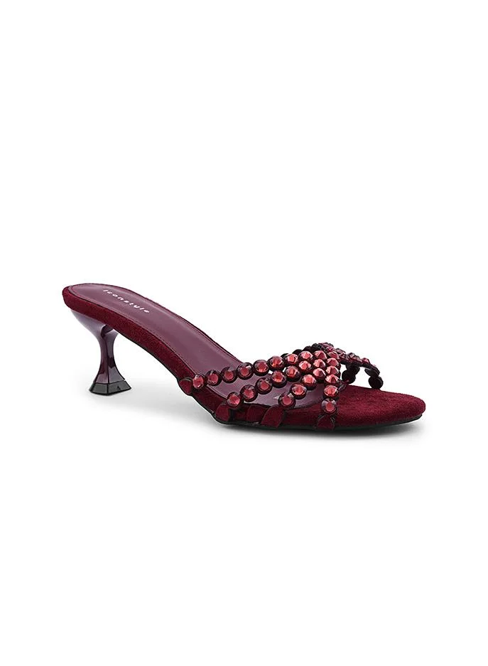 أيقون Structured heel slipper with elegant textured surface.