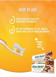 Dabur Herb'l Clove Cavity Protection Toothpaste With Toothbrush Multicolour 140 grams  - Image 2