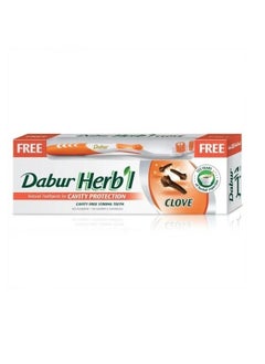 Dabur Herb'l Clove Cavity Protection Toothpaste With Toothbrush Multicolour 140 grams  - Image 1