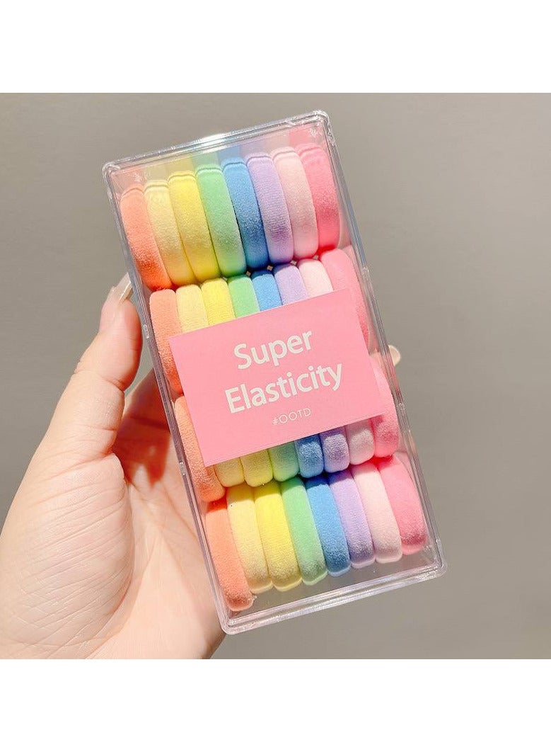 32 rainbow-colored fabric hair clips... soft, flexible, and a magical touch for every hairstyle!