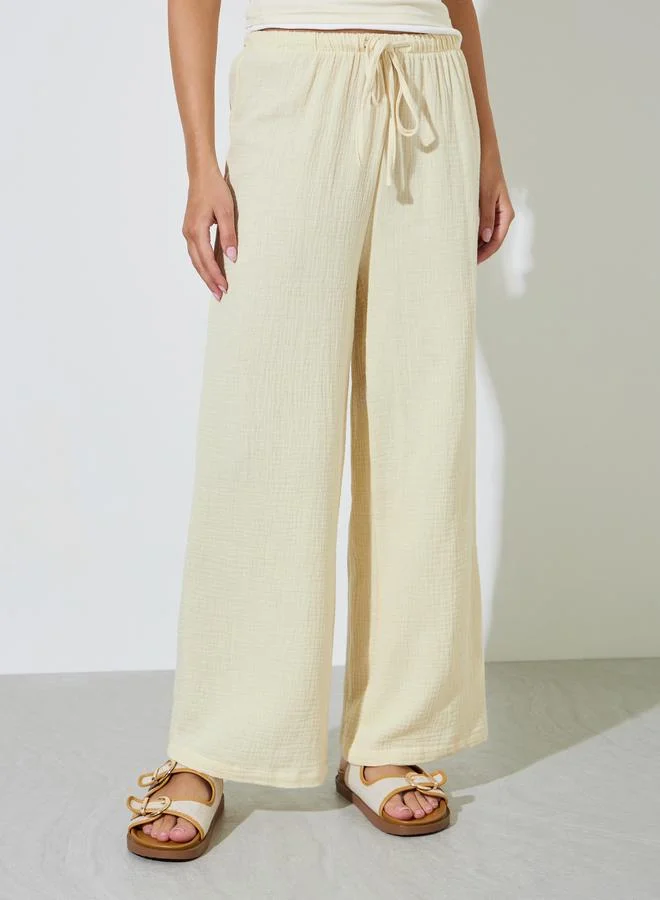 ستايلي Beige Cotton Wide Leg Pants with Drawcord