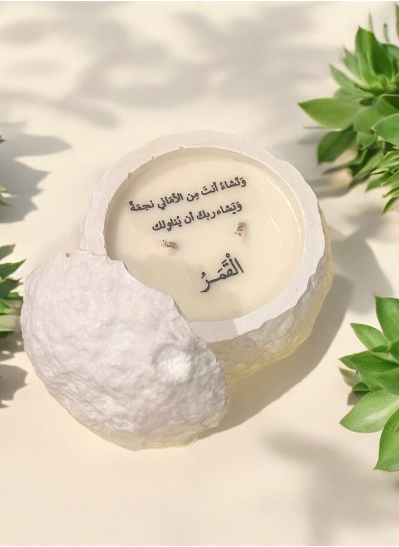 ANUM BY MUNA Moon Candle: A scented candle in the shape of the moon in white with a beautiful phrase written on it: “You wish for a star, and your Lord wishes to give you the moon (scent: peach)” 250 grams  - Image 1