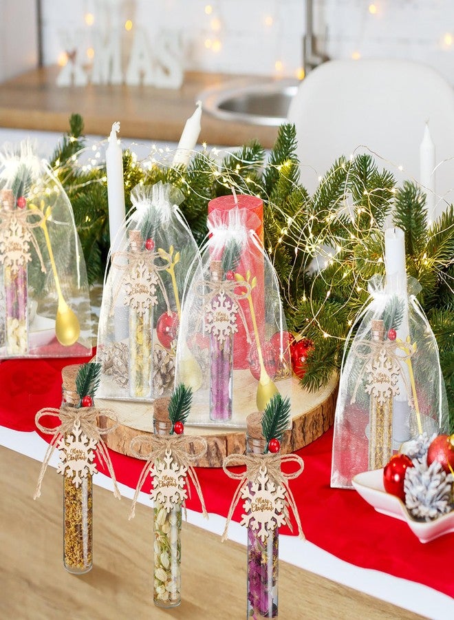 نوجو مجموعة نوجو من 24 قطعة هدايا لحفلات شاي عيد الميلاد، هدايا بالجملة لضيوف حفلات شاي عيد الميلاد، تتضمن برطمان شاي زجاجي 4.13 بوصة، ملعقة شاي من الفولاذ المقاوم للصدأ، بطاقة هدايا على شكل ندفة ثلج، حقيبة من الأورجانزا وحبل لهدايا عيد الميلاد. - Image 3