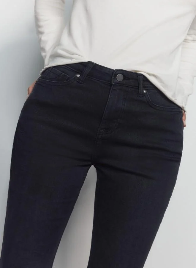 Springfield  High-waisted jeans with front and back pockets, button and zip fastening fastening , and a slim fit with a flared hem . These jeans feature a state-of-the-art washing process that reduces water, chemical, and energy consumption. for Women | Best Price UAE