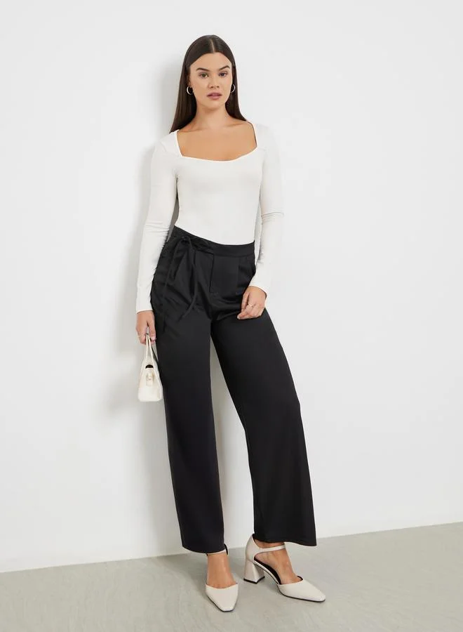 ستايلي بنطال سادة بكسرات وأربطة