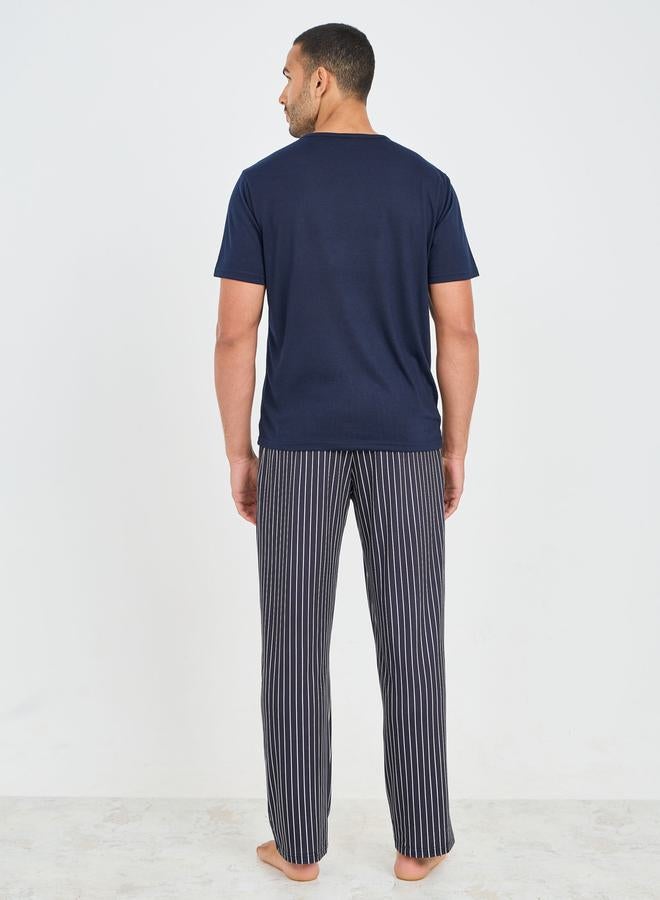 Styli Styli Slogan Print T-shirt and Striped Pyjama Set  - Image 4