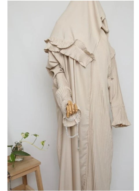 A prayer sheet of the type of robe with an attached veil and slits that add to its beauty and elegance