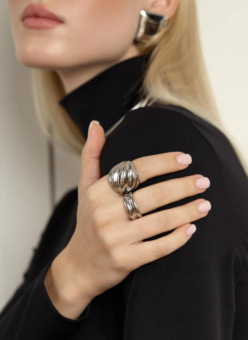 Wide twisted ring