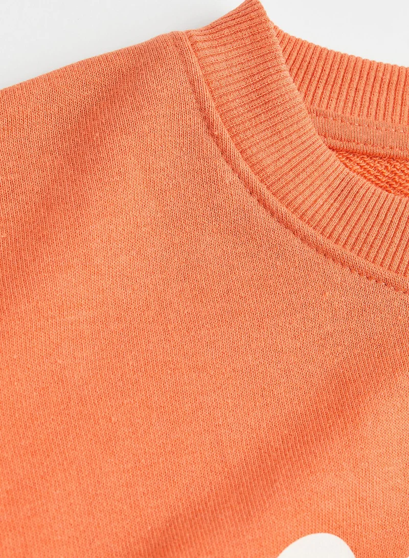 اتش اند ام كنزة قطنية كبيرة بطبعة رسومات للأطفال