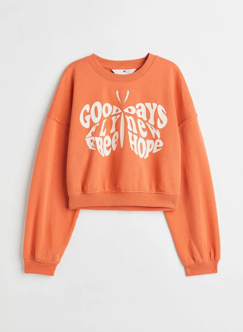 اتش اند ام كنزة قطنية كبيرة بطبعة رسومات للأطفال