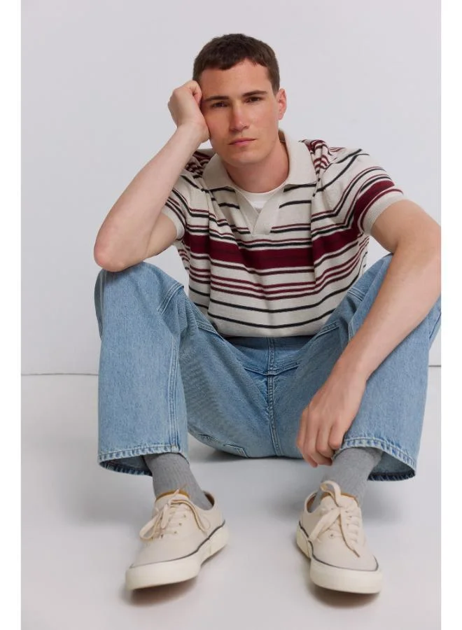Springfield  Irregular striped knit polo shirt for Men | Best Price UAE