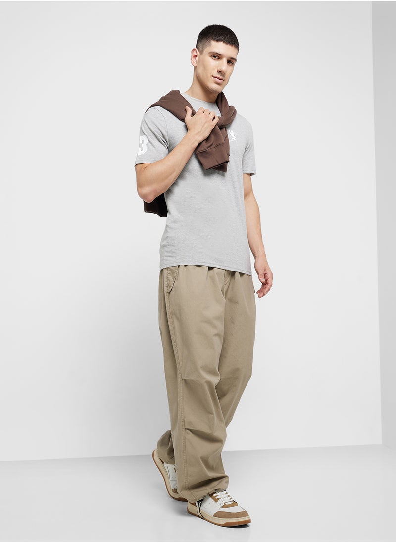 Seventy Five - Emblem Badge Tee - Image 1