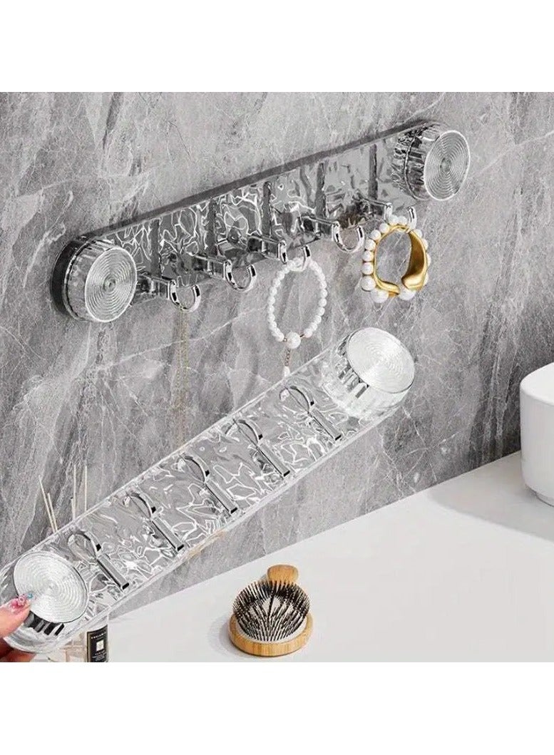 KITCHENOO A versatile hanger for easy organization without nails, drilling, or adhesive; it attaches using suction cups. | 5 movable hooks with a stylish design and a suction button - Clear - Image 1