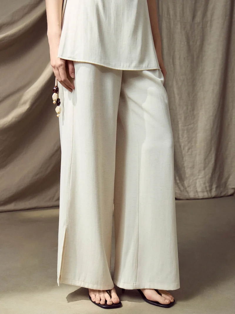 Lichi Loose-fitting viscose and linen trousers with pleats at the waist