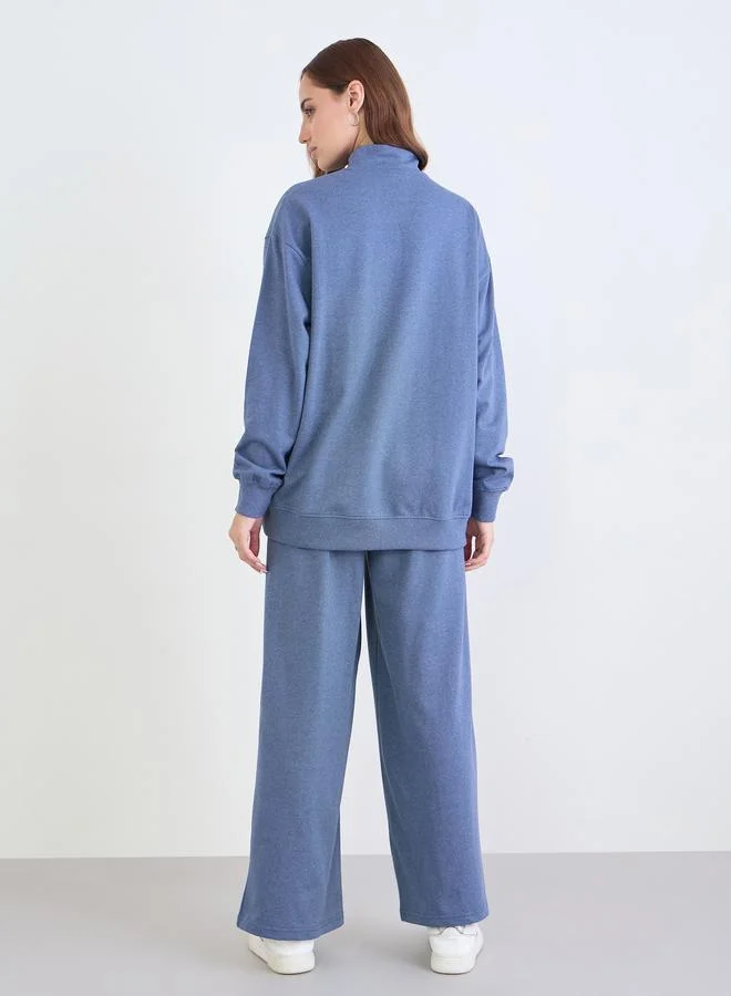 Styli  Styli Relaxed Fit Printed Sweatshirt and Wide Joggers Co-Ords for Women | Best Price UAE