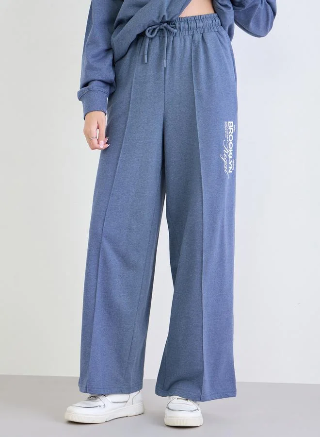 Styli  Styli Relaxed Fit Printed Sweatshirt and Wide Joggers Co-Ords for Women | Best Price UAE
