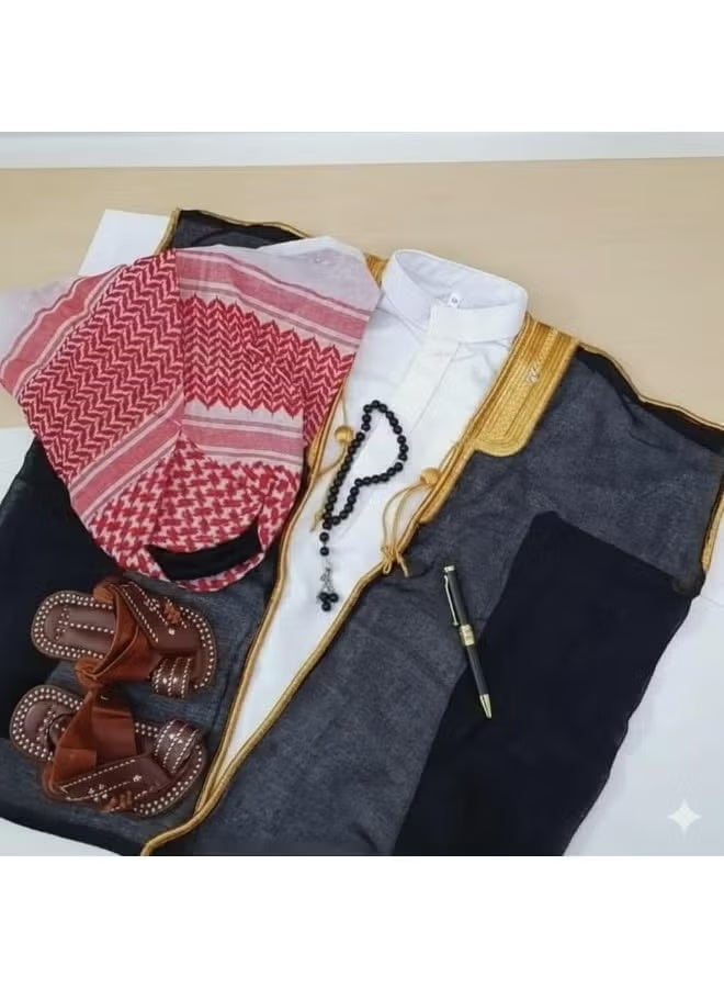 Elegant children's set including a sewn headband, cap, cloak, thobe, sandals, children's prayer beads, and a children's pen for a one-year-old